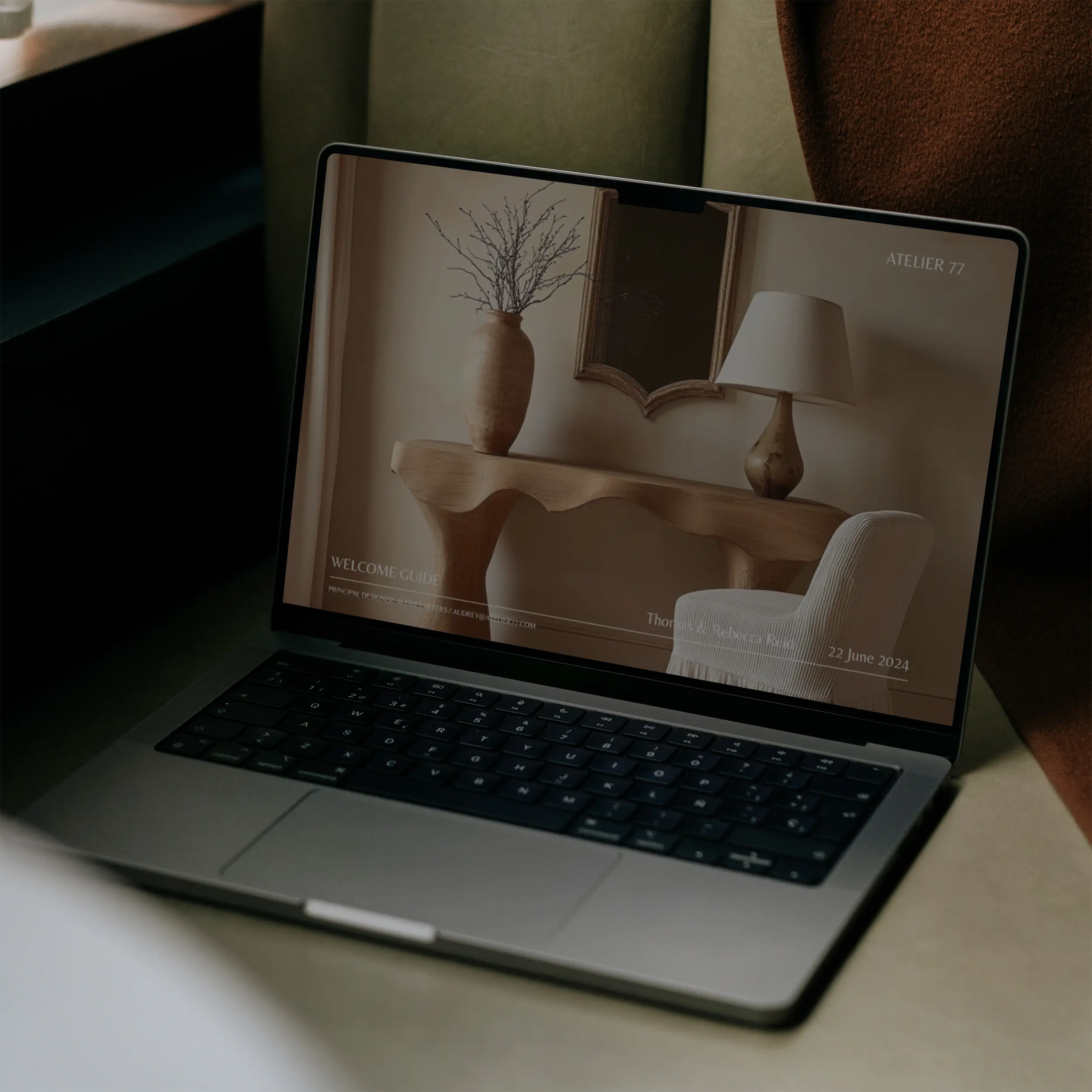 laptop featuring welcome guide template cover page on screen