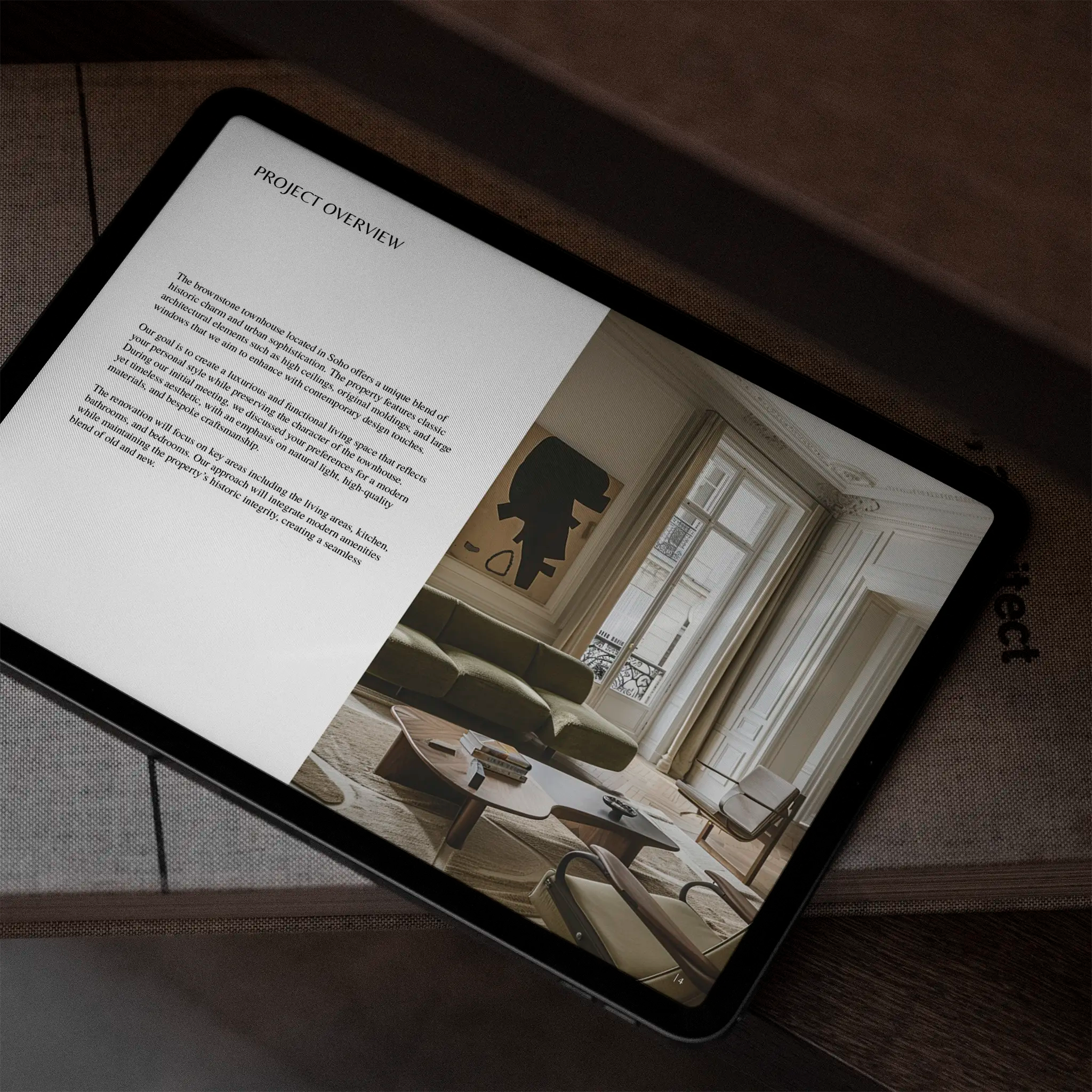 Tablet displaying a design project overview with interior design images on a wooden surface.