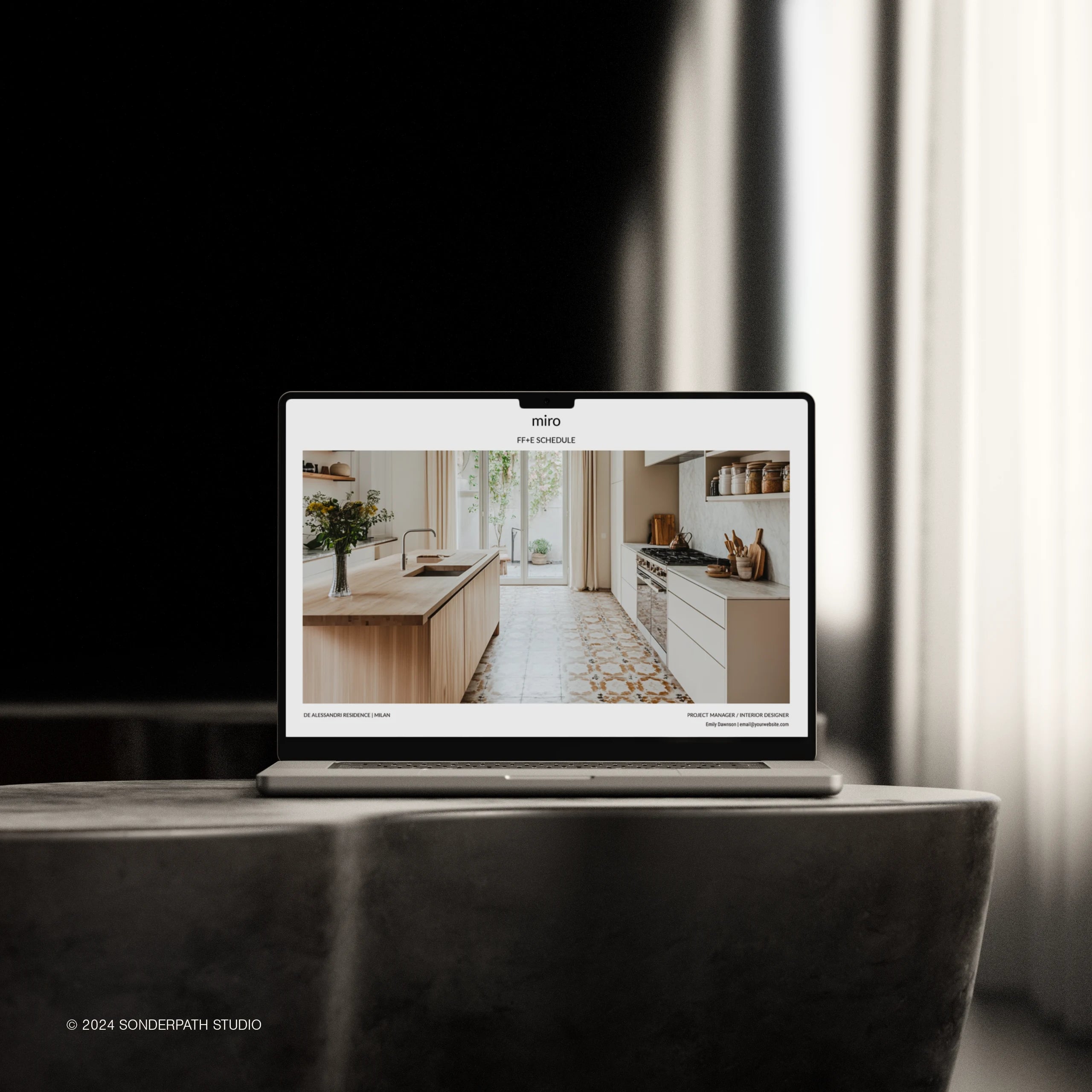 Laptop screen showing cover page of an FFE Schedule template for interior designers