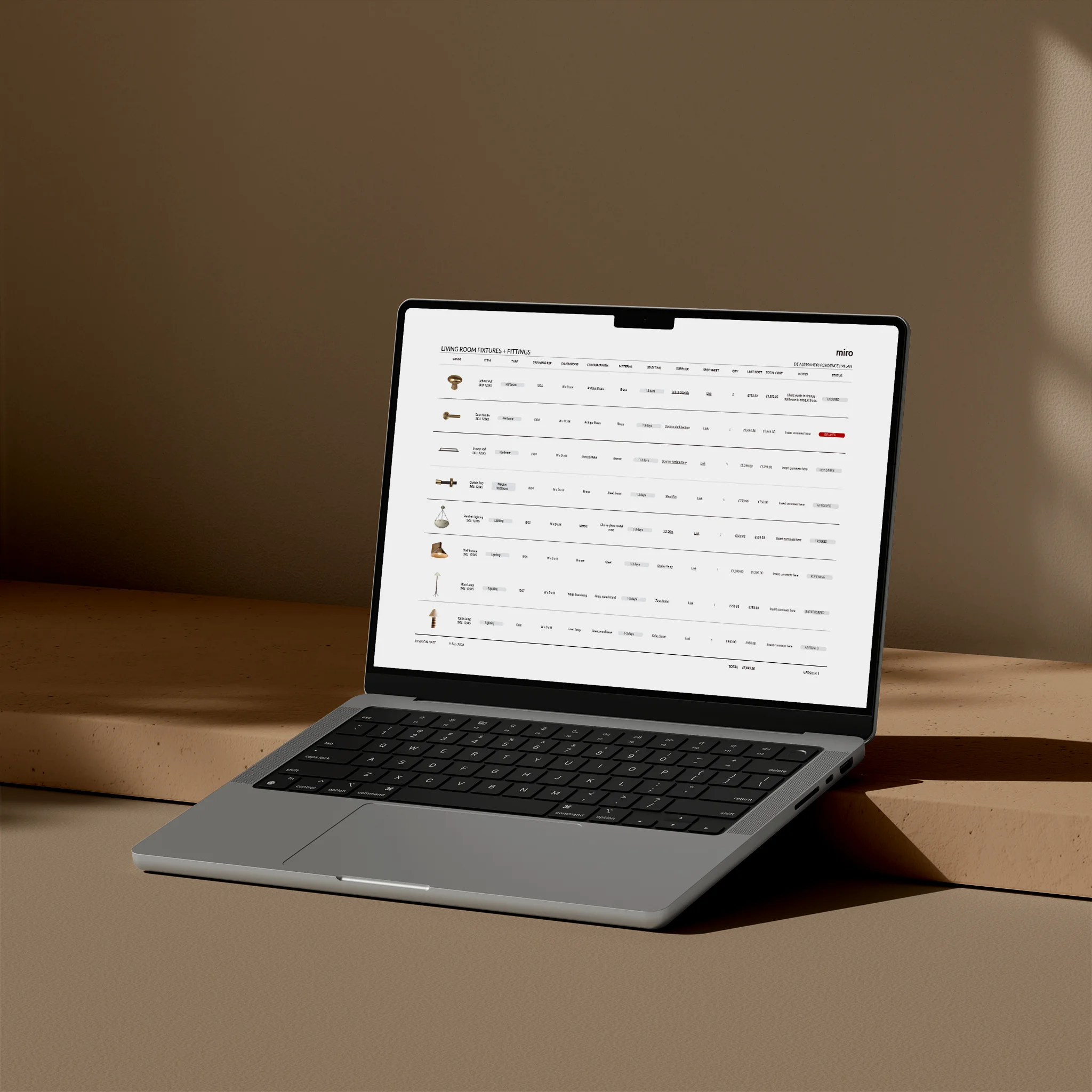 Laptop on a wooden surface with a brown background. Featured in macbook pro is an FFE Schedule template for interior designers.