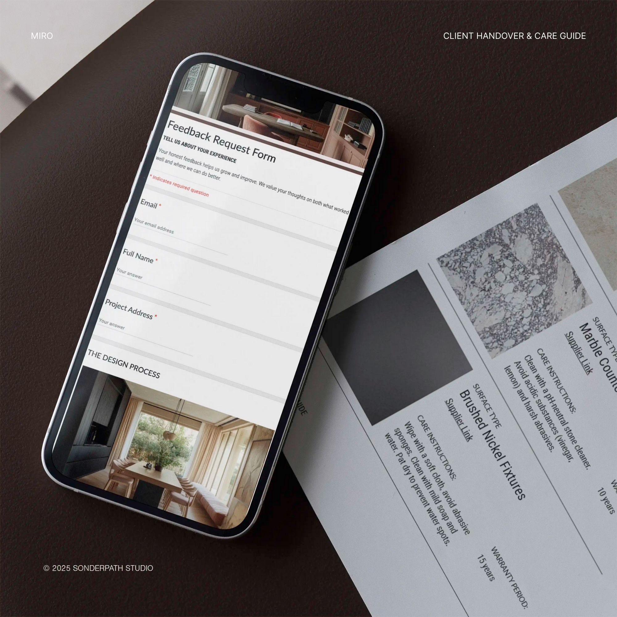 Phone displaying a feedback request form on a surface with printed materials